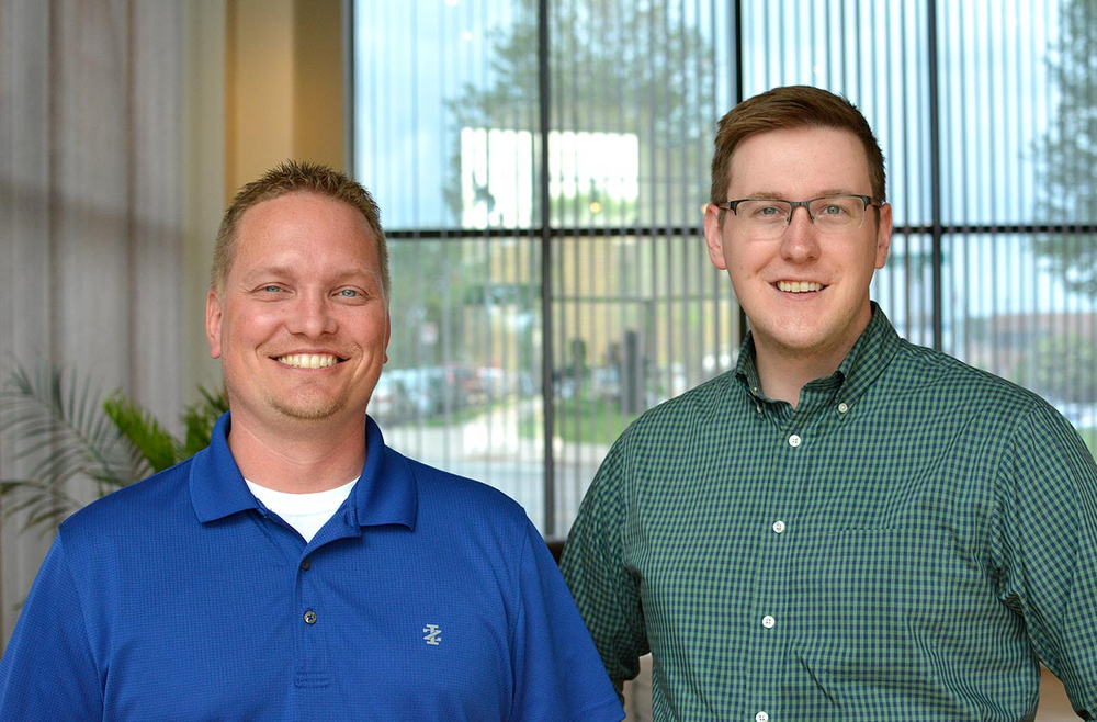 Corey Sader (Front-End Web Developer) and Brian Miller (Web Designer) at Plaudit Design